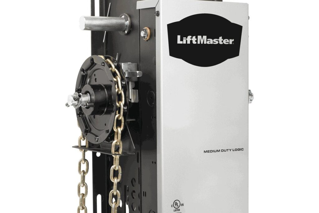 A white lift with chains attached to it.