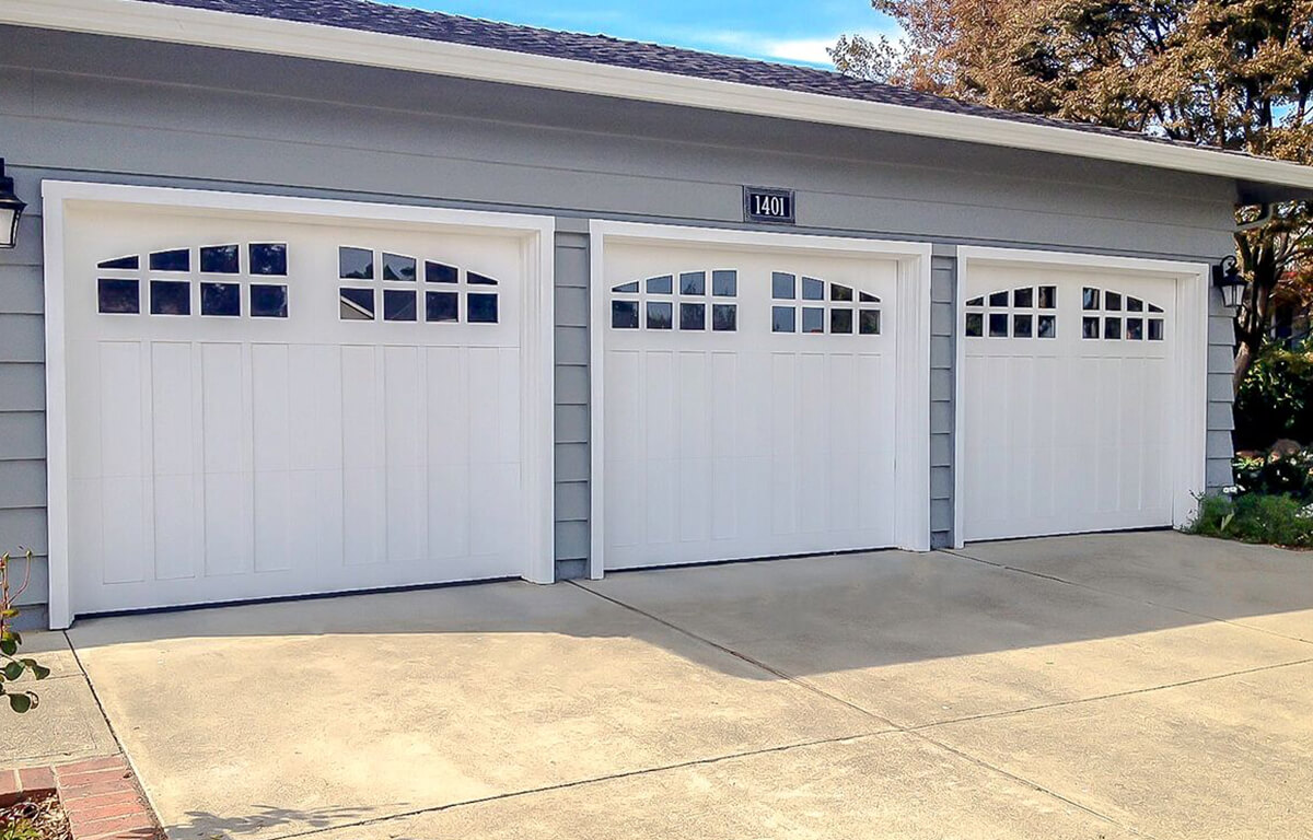 5d76a1a45b32331913826033_Carriage House Craftsman Wood Garage door