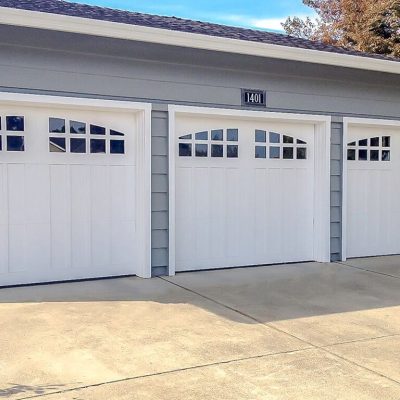 5d76a1a45b32331913826033_Carriage House Craftsman Wood Garage door